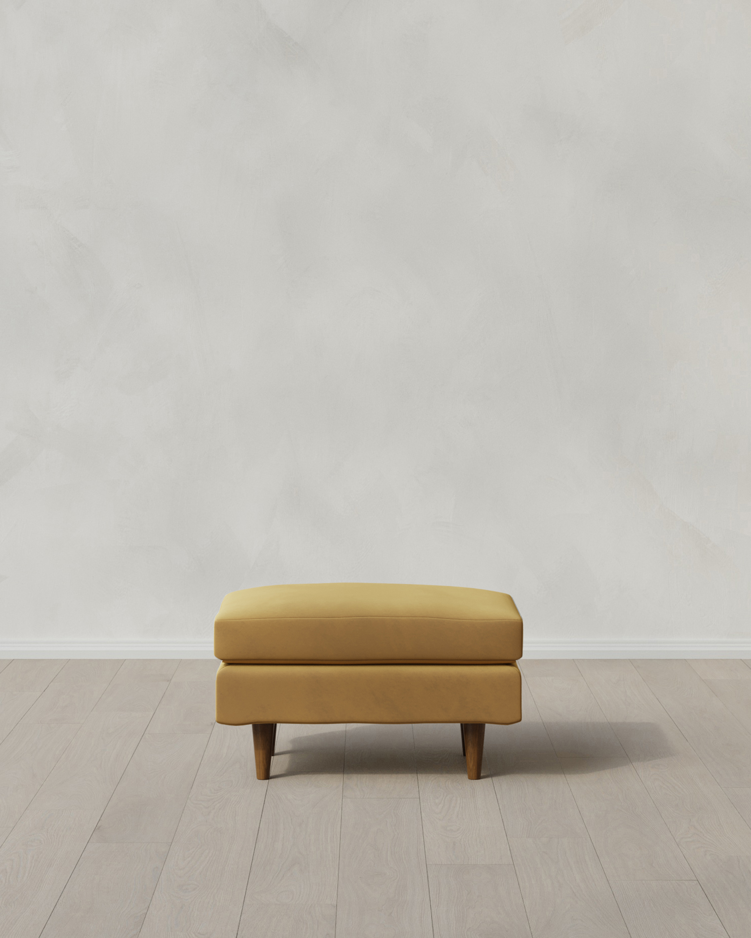 Atlas Midcentury Ottoman in Performance Velvet